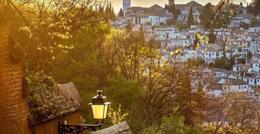 Sunset view of Granada, Spain, from an ancient wall.