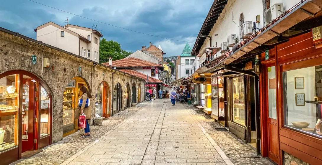 Picturesque street in Sarajevo's Old Town with traditional shops.