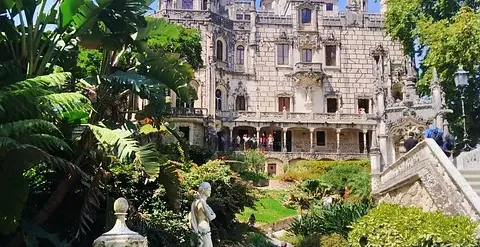 Explore the stunning Quinta da Regaleira Palace and gardens in Sintra, Portugal.