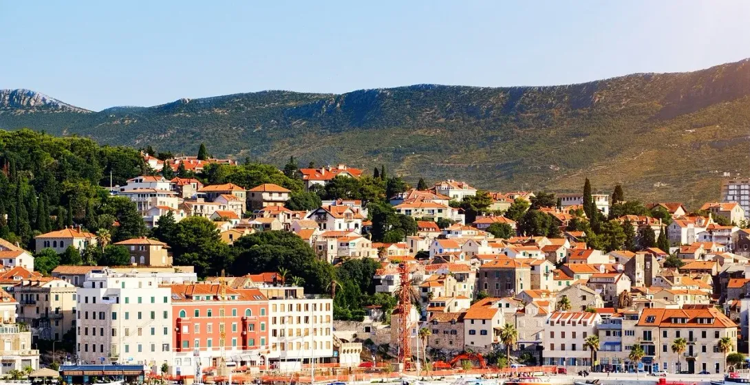 Stunning view of Split, Croatia's waterfront and hillside buildings.