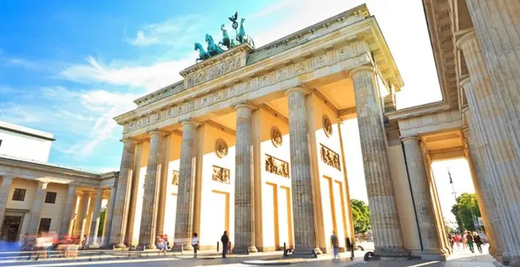 Tourists visiting the Brandenburg Gate in Berlin, Germany.