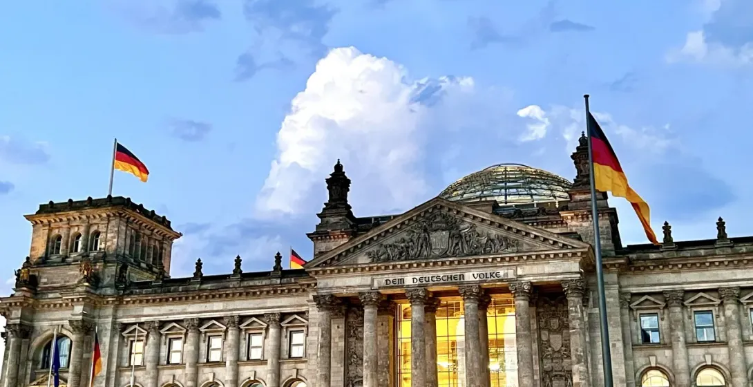 The Reichstag Building in Berlin, Germany, at dusk.