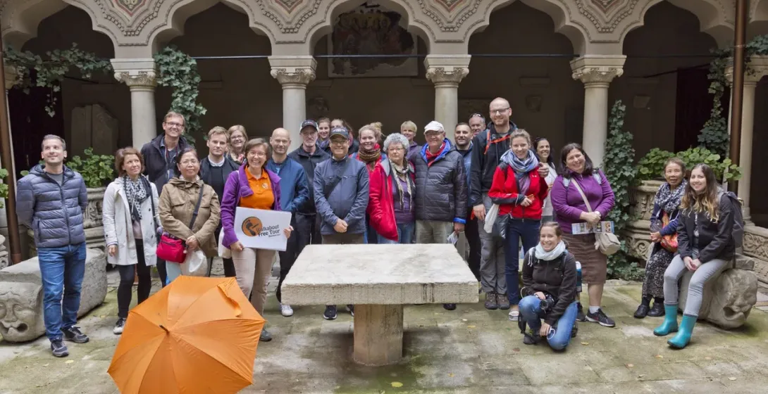 Happy tourists on a Walkabout Free Tour in Bucharest, Romania.