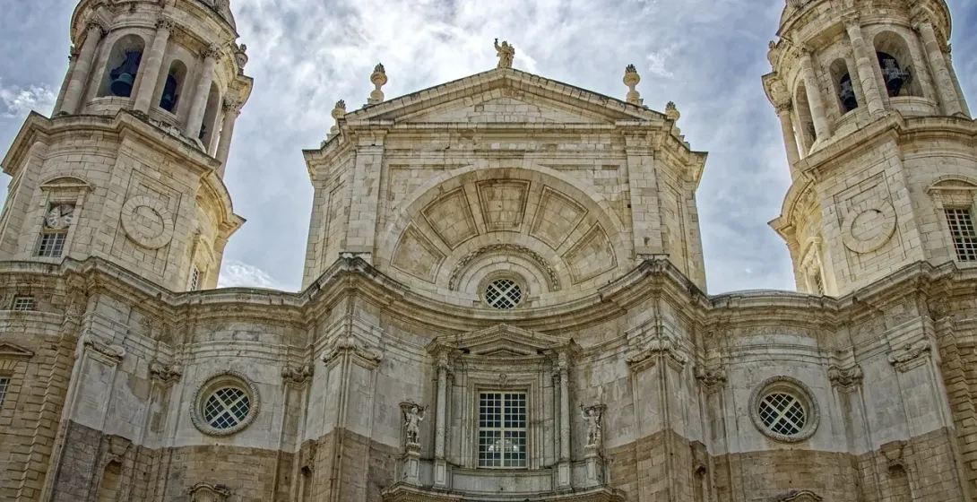 The impressive facade of Cádiz Cathedral in Spain.