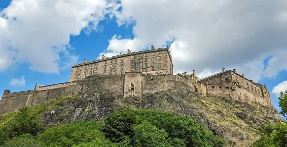 Edinburgh Castle, a majestic fortress perched on a rock, overlooking the city.
