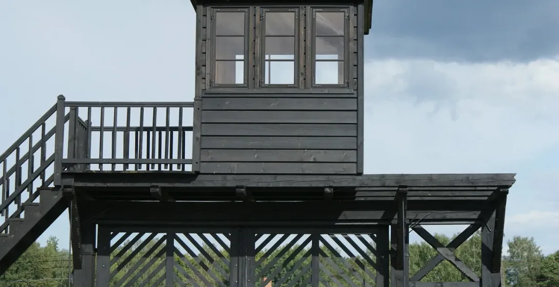 Guard tower and gate at the entrance to KL Stutthof Concentration Camp in Gdansk, Poland.