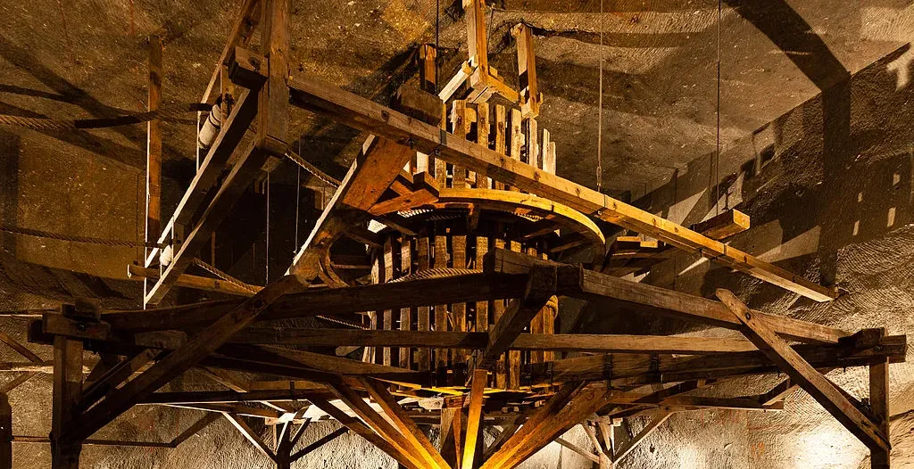 Intricate wooden horse-powered hoist inside the Wieliczka Salt Mine.
