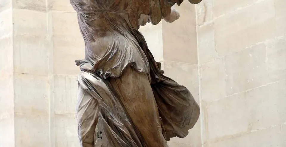 The majestic Winged Victory of Samothrace at the Louvre Museum in Paris.