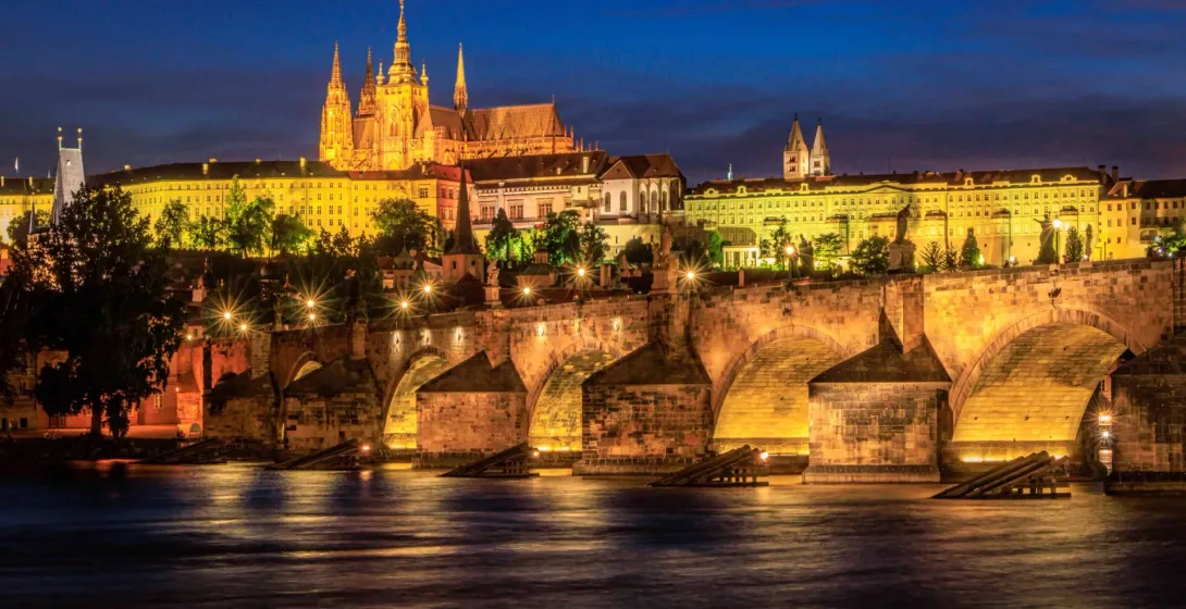 Prague Castle and Charles Bridge at night.