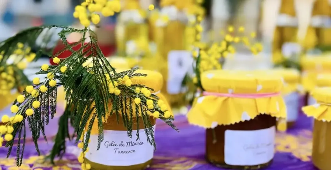 Jars of mimosa jelly at a market in Tanneron, France.