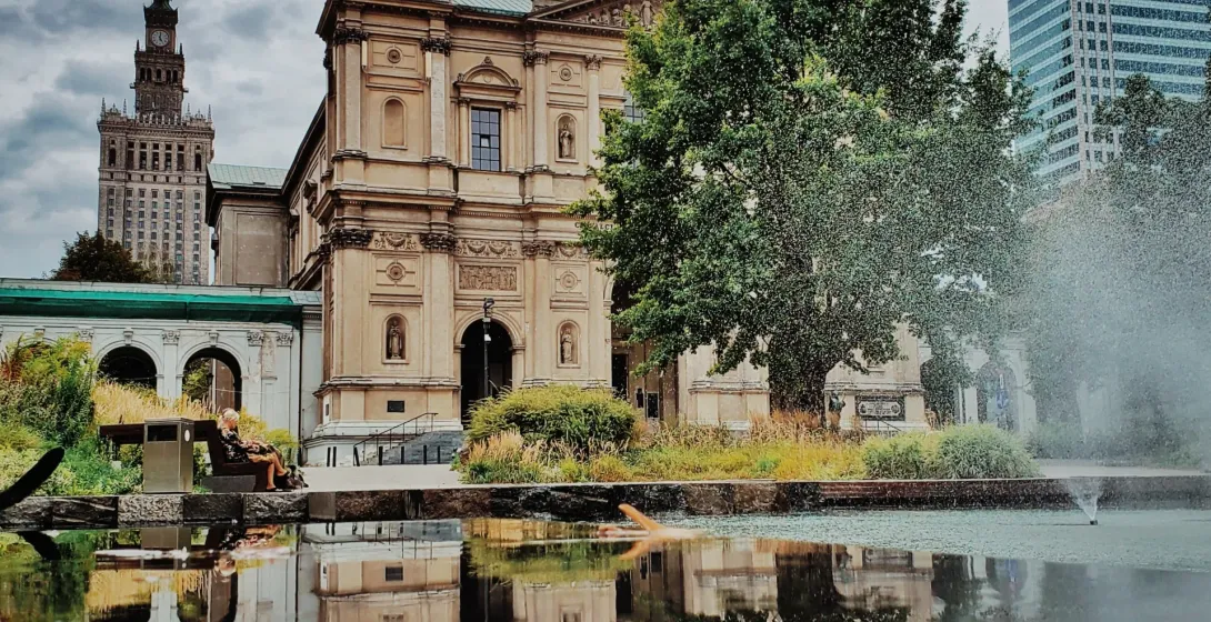 The Church of St. Alexander in Warsaw reflected in a fountain.