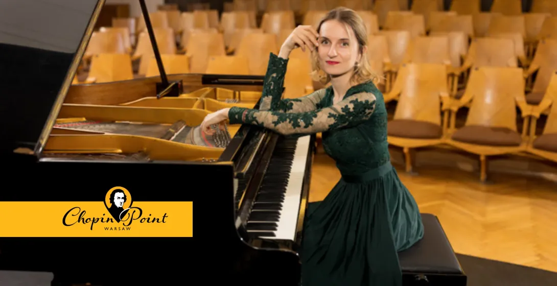 Pianist at a grand piano in a Warsaw concert hall.