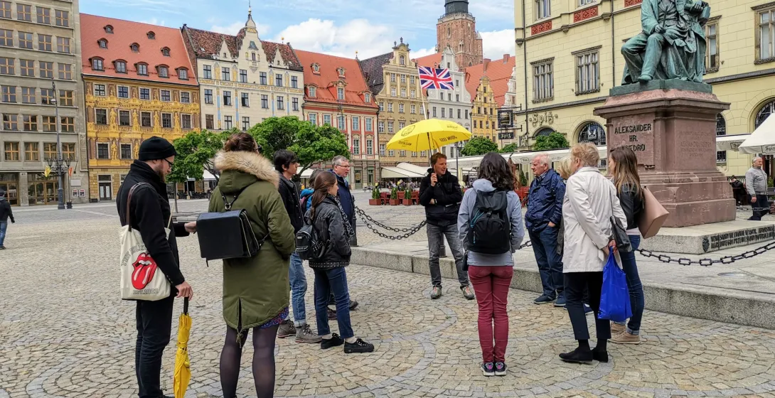 Guided walking tour in Wrocław's Market Square.