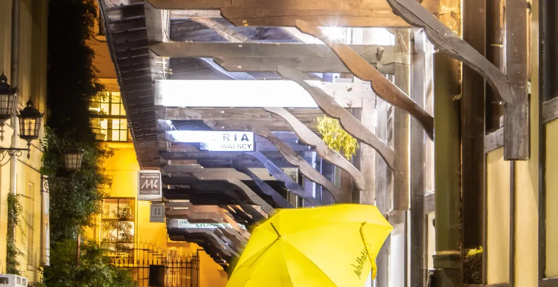 Yellow umbrella with WALKATIVE! in Wroclaw, Germany.