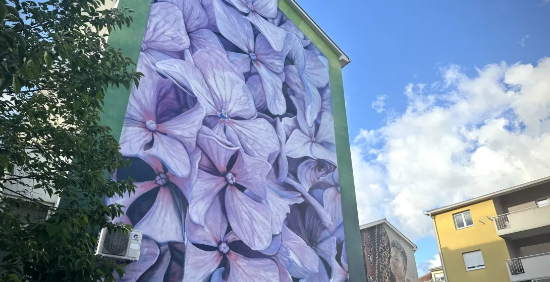 A stunning mural of purple hydrangeas adorns a building in Zagreb, Croatia.