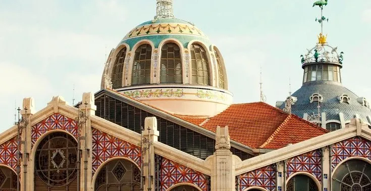 The ornate, tiled domes and colourful ceramic decorations on the exterior of Valencia's Central Market.