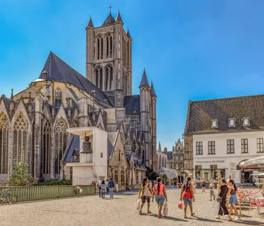 Tourists exploring the historic center of Ghent, Belgium, on a Legends of Ghent Tour.