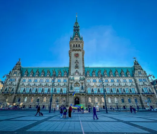 Hamburg City Hall, a stunning architectural landmark, on a sunny day.