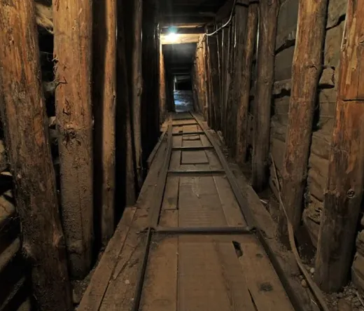 Interior of a dark, historical tunnel in Sarajevo.