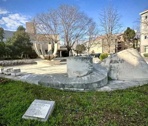 Stone monument in a Mostar park.