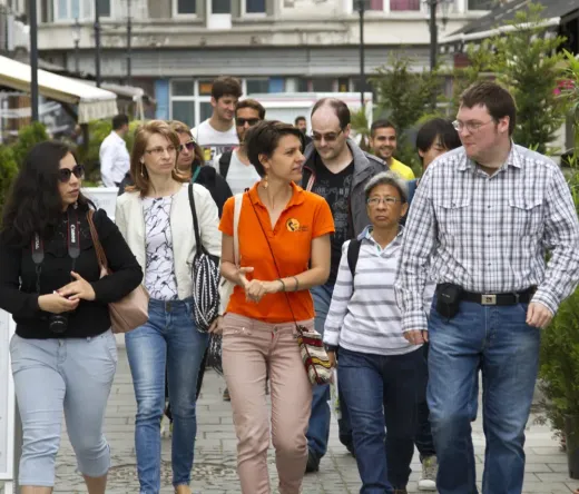 A group of tourists on a city walking tour.