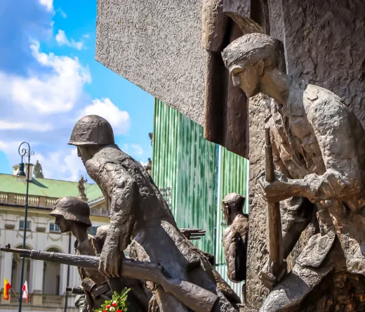 Bronze monument of soldiers in Warsaw, Poland.