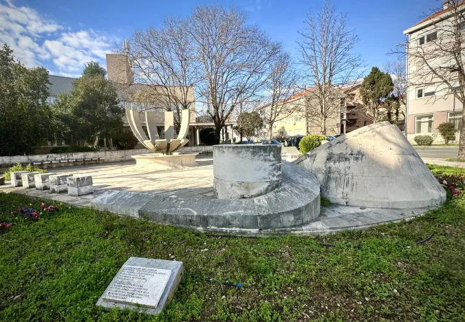 Stone monument in a Mostar park.