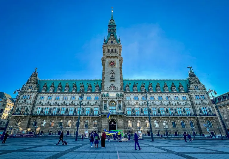 Hamburg City Hall, a stunning architectural landmark, on a sunny day.