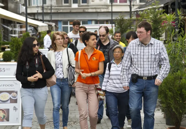 A group of tourists on a city walking tour.