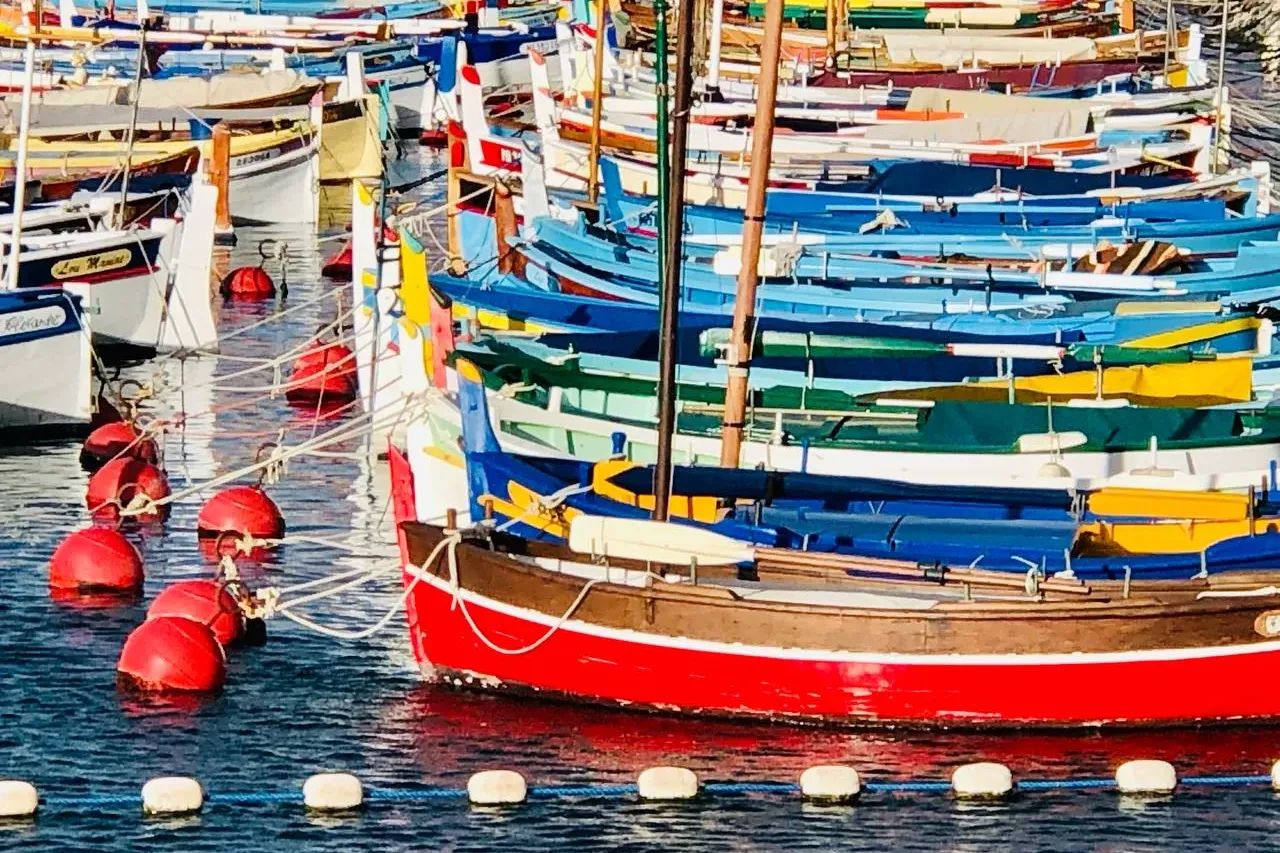 Colorful boats in the harbor of Nice, France.