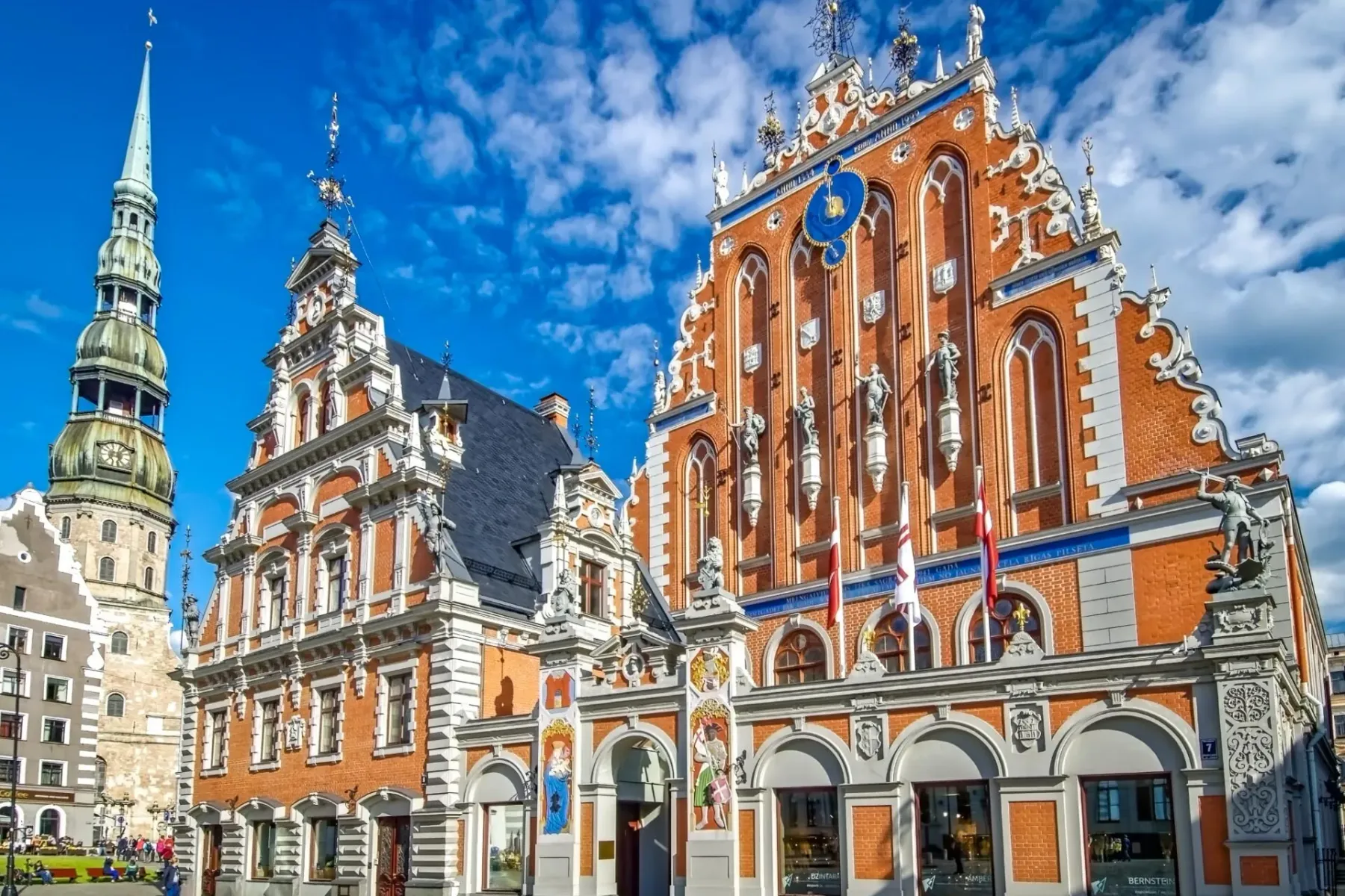 Explore Riga's Old Town: House of the Blackheads & St. Peter's Church.