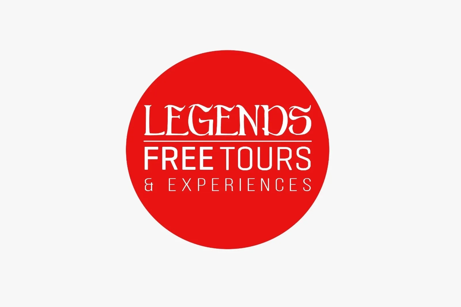 Logo for Legends Free Tours & Experiences, with white text on a red circular background.