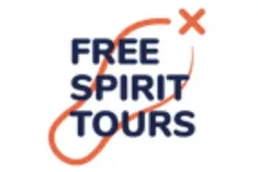 Logo for Free Spirit Tours featuring blue text and an orange looping path graphic with an 'x' mark.