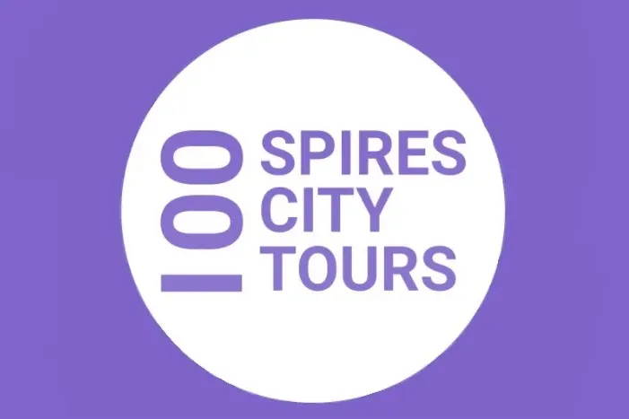 Logo for '100 Spires City Tours' featuring the number 100 stacked vertically in purple, next to the words 'Spires City Tou...