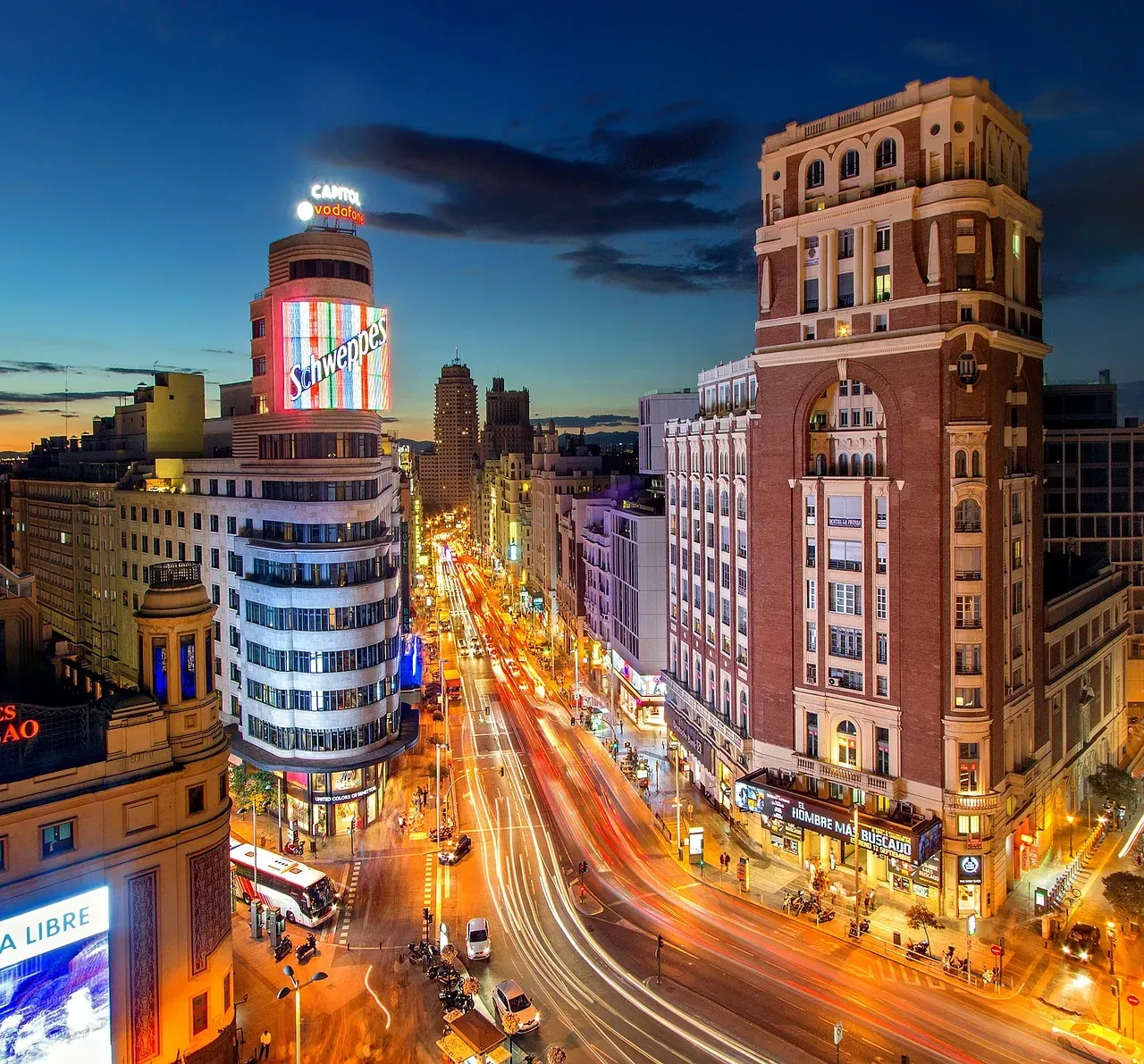 Sunset view of Madrid architecture under a clear blue spring sky.