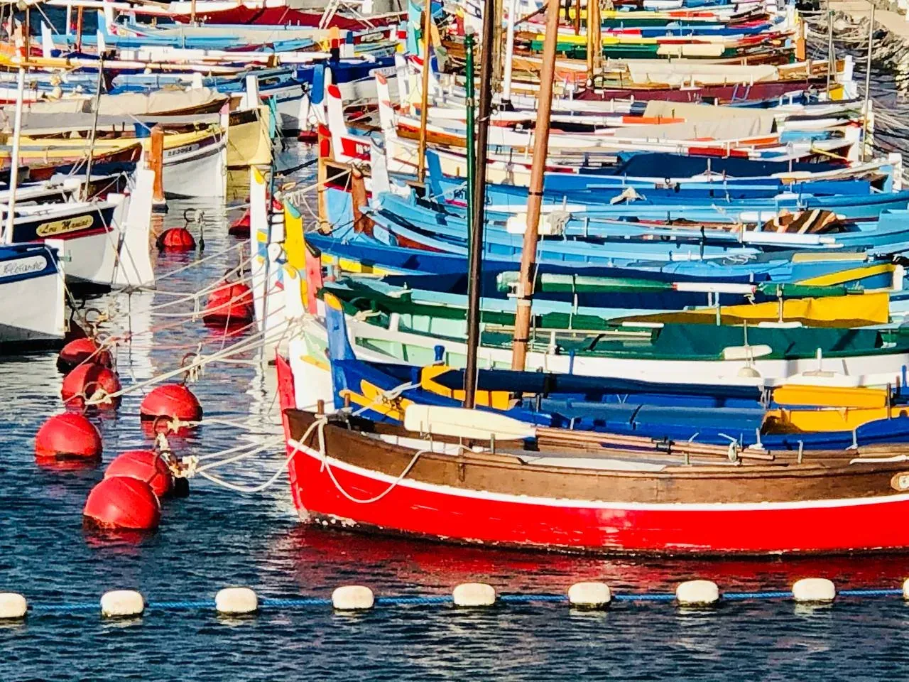 Colorful boats in the harbor of Nice, France.