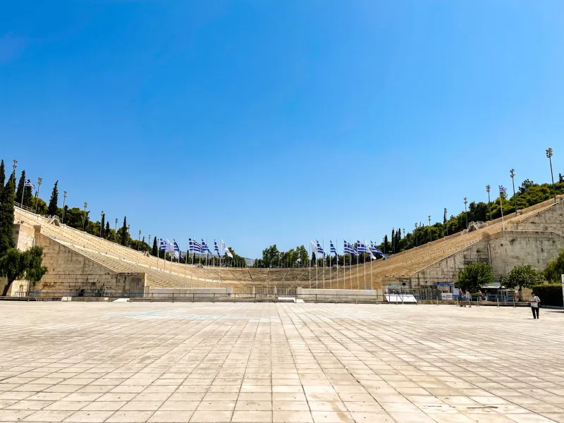 Panathenaic Stadium in Athens, Greece, a stunning marble stadium under a clear blue sky.