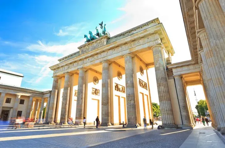 Tourists visiting the Brandenburg Gate in Berlin, Germany.