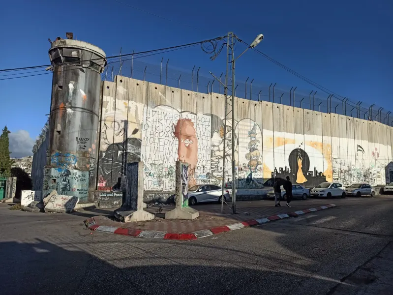 Vibrant murals on the West Bank Barrier in Bethlehem, Palestine.