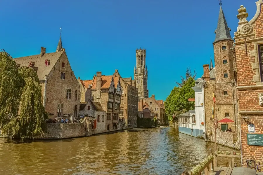 Charming canals and medieval architecture in Bruges, Belgium.
