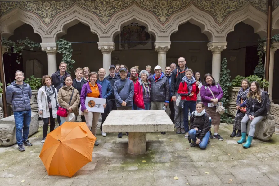 Happy tourists on a Walkabout Free Tour in Bucharest, Romania.
