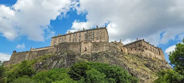 Edinburgh Castle, a majestic fortress perched on a rock, overlooking the city.
