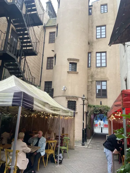 Enjoy a delightful meal in a charming Edinburgh courtyard restaurant.