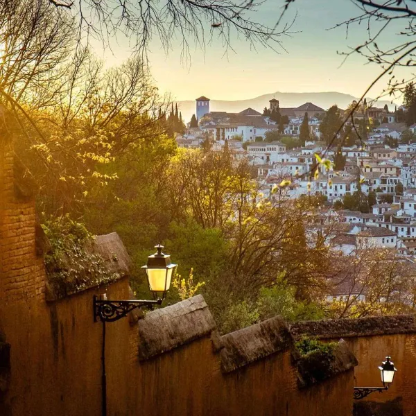Sunset view of Granada, Spain, from an ancient wall.