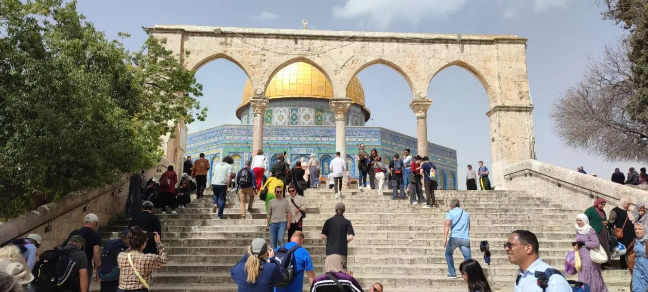Tourists visiting the Dome of the Rock in Jerusalem.