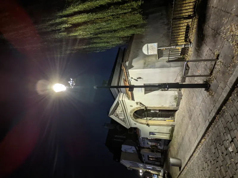 Historic building in Krakow at night.