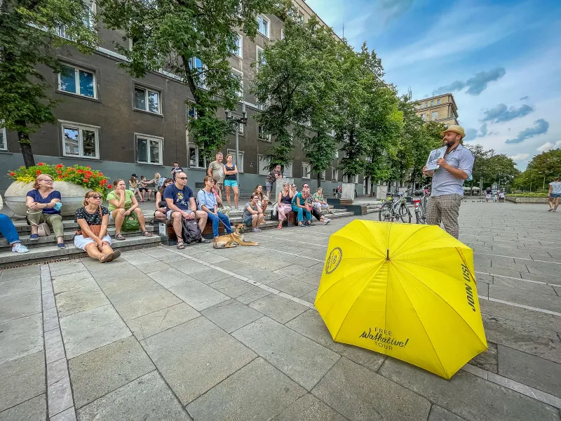A large group enjoys a free Walkative! walking tour in Krakow, Poland.