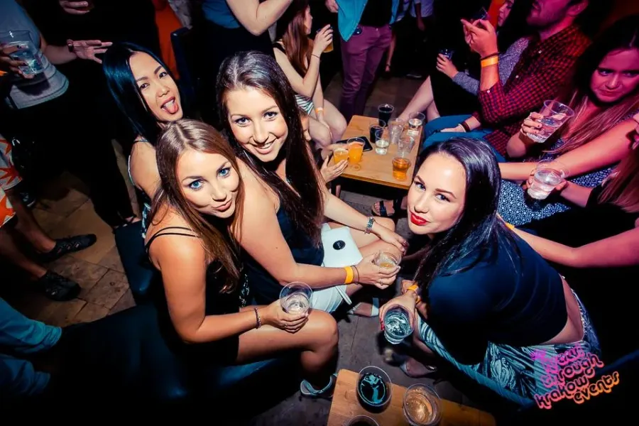 Group of friends enjoying a night out in Krakow.