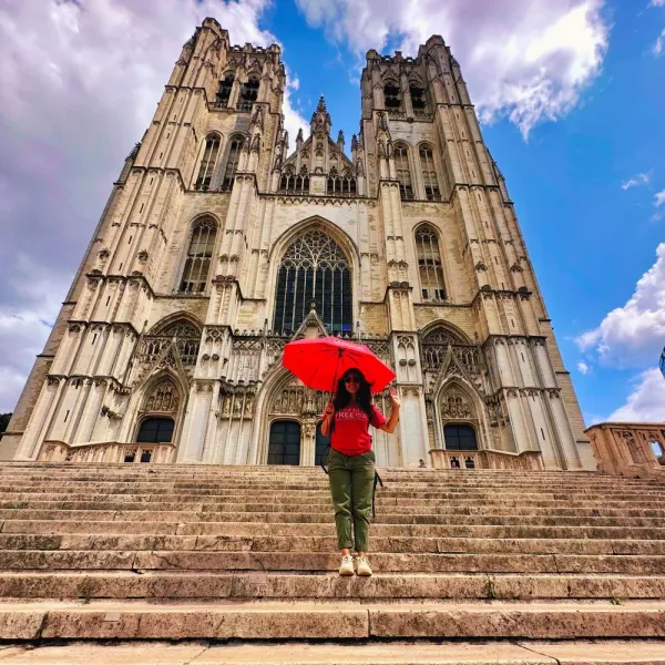 Tourist at St. Rumbold's Cathedral in Mechelen, Belgium.