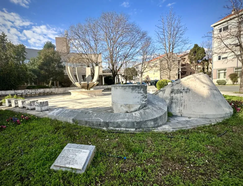 Stone monument in a Mostar park.
